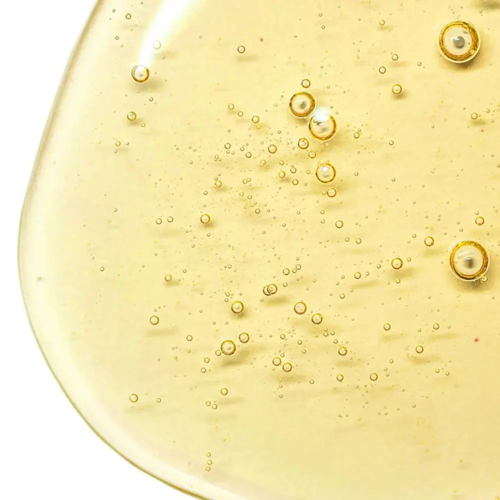 Close-up texture of Baie Botanique regenerating rose face wash showing lightweight gel-cream consistency