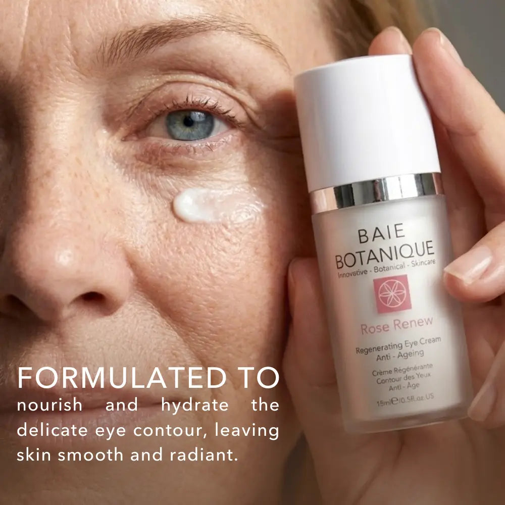 Model applying Baie Botanique regenerating rose anti-ageing eye cream to the under-eye area
